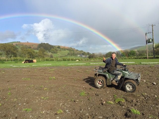 Field reinstated after ground loops were buried, with a rainbow overhead